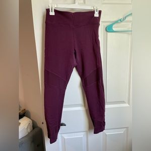Maroon workout leggings. Has sheer parts as seen in the pic